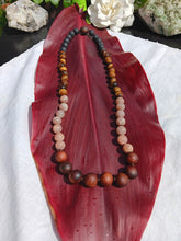 Load image into Gallery viewer, “Hawaiian Island Necklace” - Koa, Peach Moonstone, Tiger Eye, and Lava Stone.