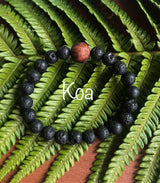 "Spurring with a Hawaiian Wood Bead" - Lava Stone Stone Bracelet with Hawaiian Wood Bead