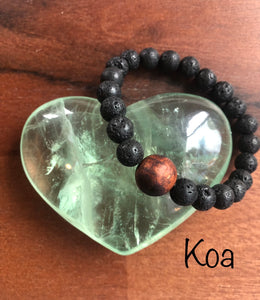 "Spurring with a Hawaiian Wood Bead" - Lava Stone Stone Bracelet with Hawaiian Wood Bead
