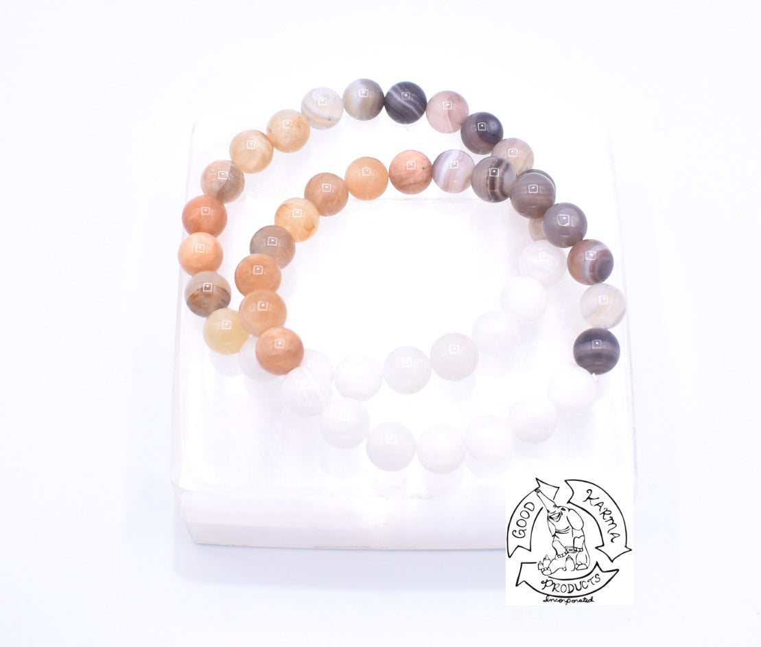 Elevating Ease” - Peach Moonstone, Botswana Agate, and Moonstone Ston –  Good Karma Products Incorporated, image size:1109x942